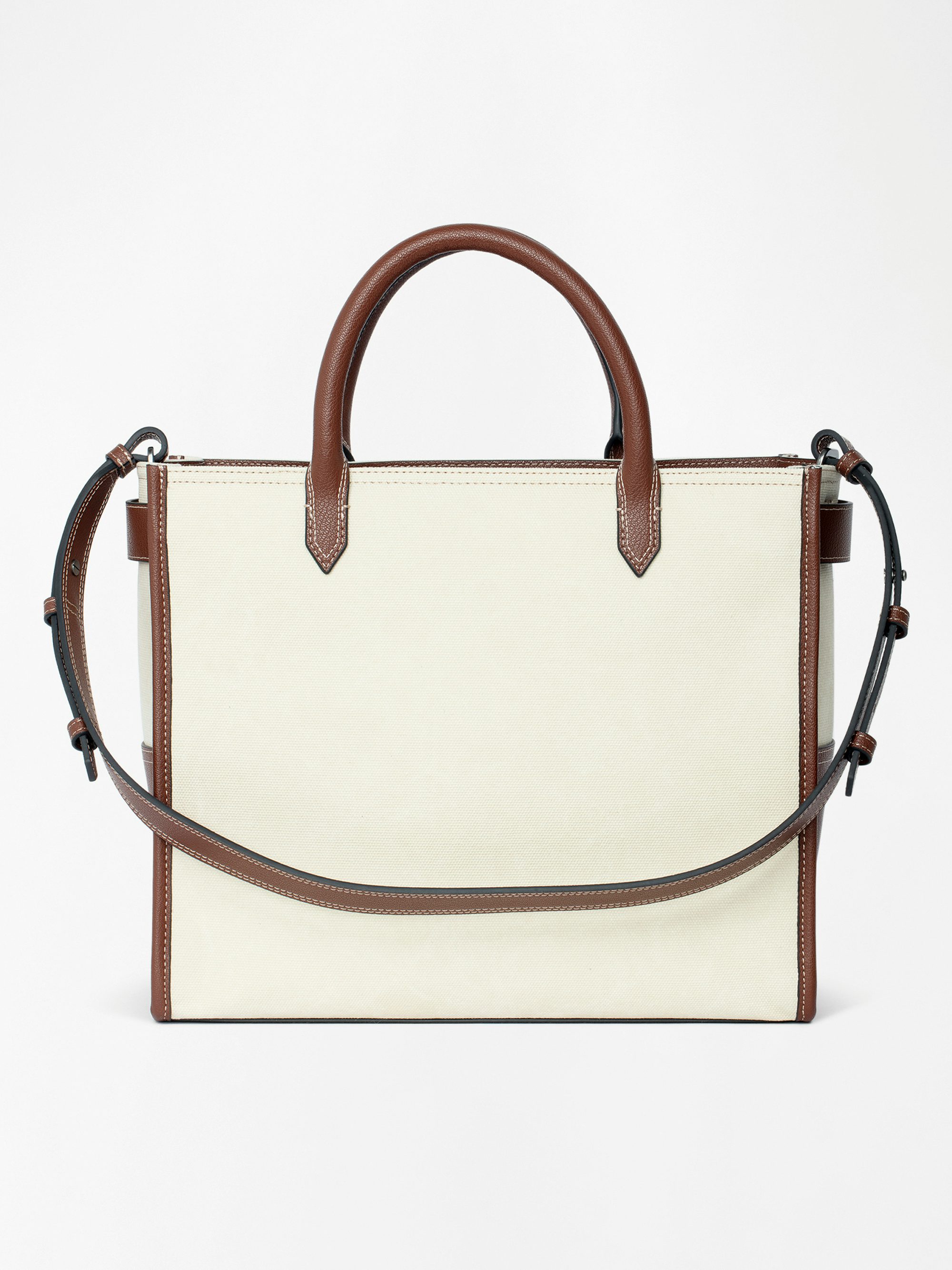 Angel Tote - Canvas and grained leather tote bag with double handles, shoulder strap and wing signature.